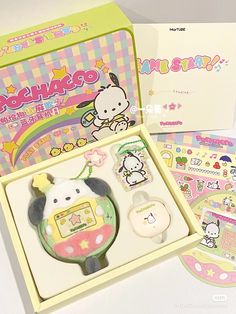 hello kitty stationery set in a box with its contents opened and ready to be used