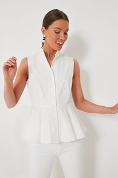 The Paulina Top is the warm-weather piece that will instantly update any look. With a mandarin collar that adds a dash of tailored class, this subtle fit-and-flare style is designed with a peplum hem that makes it stand out. Plus, the all-over white colorway pairs well with any and everything. From denim to trousers, heels to sneakers, work to play, this sleeveless style does it all and will have you looking your best with just a few finishing touches.  Mandarin collar Sleeveless Button front placket Peplum hem Material: 100% Cotton Care: Machine wash cold, do not bleach, hang to dry, low iron Cocktail Attire, Peplum Hem, Work Tops, Work Fashion, Mandarin Collar, Pullover Sweatshirts, White Top, Warm Weather, Day Dresses