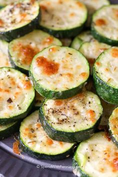 zucchini with cheese and seasoning on top