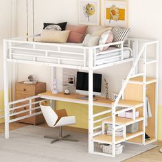 a white loft bed sitting next to a desk with a computer on top of it