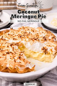 a close up of a pie on a plate with the words coconut meringue pie