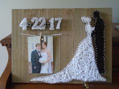 a wedding picture frame with a bride and groom on it