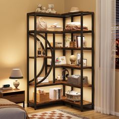 a room with a book shelf filled with lots of books and other things on top of it