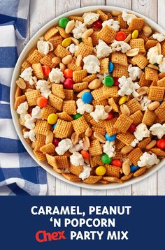 a bowl filled with cereal and candy on top of a table