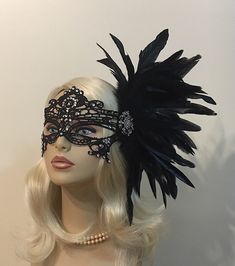 "Black Lace Masquerade Mask with Feathers and Crystals, Women's Lace Mask, Masked Ball, Wedding Masquerade Masks, Bridal Wedding Mask Beware of cheap imitations that use glue! This is an original design by IceGreenEyes. Stiffened and lace mask will not sweat your face like the cheap plastic ones. The mask is also shaped so you have lots of room around the eyes instead of a skinny slice. These masks are hand stitched, not held together with sticky glue that will heat up and fall apart before the Black Masquerade Mask For Halloween Wedding, Black Masquerade Mask For Wedding Carnival, Elegant Formal Masquerade Mask For Halloween, Elegant Fitted Masquerade Mask For Mardi Gras, Black Wedding Headpiece For Carnival, Glamorous Fitted Wedding Headpiece, Elegant Fitted Masquerade Mask For Costume Party, Wedding Masquerade Mask With Rhinestones, Adjustable Masquerade Mask For Wedding Carnival