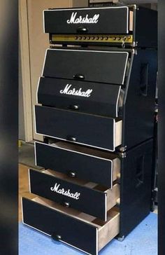 three black drawers stacked on top of each other with the words marshall written on them