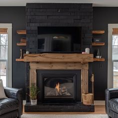 Please do not purchase a Mantel or shelves without first filling out the Quote Form and receiving a quote from us. Quote Form: https://form.jotform.com/240524957086059 Transform your fireplace into a focal point of rustic elegance with our Reclaimed Wood Beam Fireplace Mantels with Matching Shelves collection. Crafted from exquisite reclaimed pine wood beams, each mantel radiates timeless charm and character, while the accompanying shelves offer both aesthetic appeal and practical functionality. Black Chalk Paint Fireplace, Black Wall With Fireplace, Black Brick Fireplace Painted, Rustic Living Room Wall Decor Ideas, Black Rock Fireplace, Old Fireplace Ideas, Fireplace Makeover Before And After, Interior Fireplace Ideas, Painting Fireplace Brick