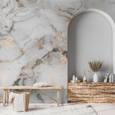 a white and gold marbled wall in a living room with a bench next to it