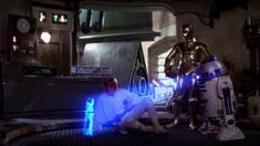 a scene from star wars with r2d2 and c - 3po