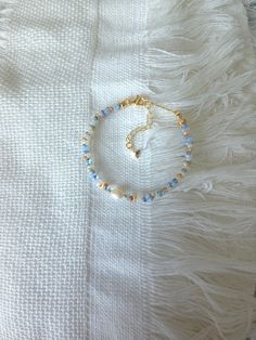 FOR OTHER DAINTY BEADED BRACELETS: https://www.etsy.com/ca/shop/ArtiChouXCanada?ref=seller-platform-mcnav%C2%A7ion_id&section_id=46088511 Bracelet Length: 13-18cm (5.1-7 inches) with a 14k gold filled or sterling silver extender. This bracelet features an assortment of summer themed pastel colors: blue, white , orange, cream, and 18k gold filled seed or sterling silver beads. It also contains a freshwater pearl.  Thread may be visible since it is a handmade product   SIZING  Wrap a soft measurin Adjustable Beaded Bracelet, Pastel Bracelet, Western Bracelets, Preppy Bracelets, Diy Jewelry Inspiration, Seed Bead Bracelet, Beads Bracelet Design, Beaded Jewelry Designs, Bracelet Dainty