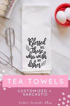 the tea towel is next to some utensils