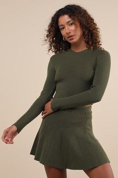 You'll embody the coziest and cutest vibes with a look like the Lulus Delightful Duo Olive Ribbed Hooded Two-Piece Sweater Mini Dress! Stretchy ribbed sweater knit shapes this two-piece set, that starts with a hooded top with long sleeves and a fitted, cropped bodice. The matching skirt features a high, elasticized waistband and a skater-style silhouette with seamed godet details and a flirty mini hem. Fit: This garment fits true to size. Length: Mid-thigh. Size medium Bust: Great for any cup si Hooded Sweater Dress, Sweater Mini Dress, Top With Long Sleeves, Pleated Mini Dress, Hooded Top, Fall Fits, Mini Sweater Dress, Skater Style, Hooded Tops