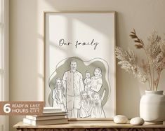 a family portrait is displayed on a shelf next to a vase with flowers in it