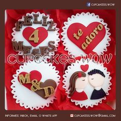 four decorated cookies in the shape of hearts with names and pictures on them, all made out of fondant