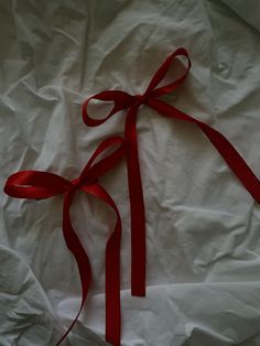 Red Reference Photo, Red Sewing Aesthetic, Red Bow Tie Aesthetic, Christmas Red And White Aesthetic, Red Bunny Aesthetic, Pop Of Red Aesthetic, Red Bows Aesthetic, Red Ribbon Wallpaper, Red Collage Wallpaper Aesthetic