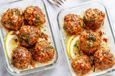 two trays filled with meatballs and lemon slices