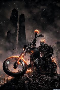 a man riding on the back of a motorcycle in front of a tall building with flames coming out of it