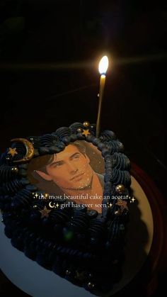 a birthday cake with a candle on it