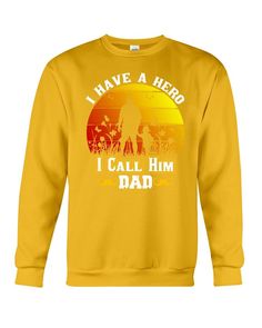 a yellow sweatshirt with the words i have a hero, i call him dad on it