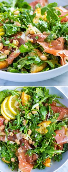 two plates filled with different types of salads on top of each other and topped with lemon wedges