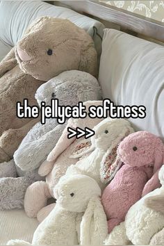 there are many stuffed animals sitting on the couch with text overlay that reads, the pellycat softness