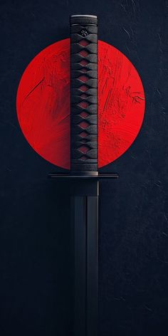 a red and black object on a metal stand in front of a dark wall with a circular design