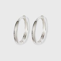 Accessorize your work or weekend look with these Silver Band Hoop Earrings from A New Day™. These sterling silver hoop earrings add shine and offer easy styling with any outfit. They feature a simple band design for minimalist style. These lightweight hoop earrings come with hinged closures for secure, easy and comfortable all-day wear, and they're made from nickel-free metal to suit most skin types. Wear them with black dresses and heels, or with everyday casual looks for effortless, chic style Cheap Small Silver Hoop Earrings, Small Tarnish Resistant Silver Hoop Earrings, Small Silver Hoop Earrings, Tarnish Resistant, Dresses And Heels, Nickel-free Small Hoop Sterling Silver Earrings, Small Hoop Nickel-free Sterling Silver Earrings, Simple Band, Band Design, Casual Accessories