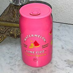 a pink watermelon can sitting on top of a counter