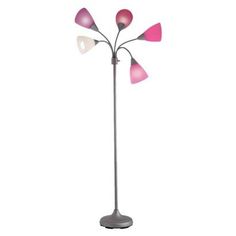 a pink and white floor lamp with three petals on it's base, in front of a white background