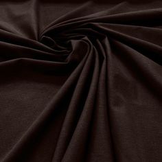 a close up shot of the dark brown color on this plain fabric, which is very soft