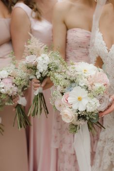 Bridesmaids in pink with meadow aesthetic bouquets Pink White And Greenery Wedding Flowers, Pink And Green Wildflower Bouquet, Wedding Florals Pink And White, Wedding Flowers Pink And Green, Summer Pastel Wedding Colors, Pink And Green Wedding Party, Pink And Green Wedding Flowers, Green White Pink Wedding, Mismatched Pink Bridesmaid Dresses