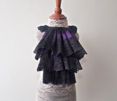 Black and purple lace jabot. Pirate party, vampire costume lace jabot. Ideal accessory for a Steampunk wedding. Fits great with a blouse.  This jabot is made from black lace. Primary photo was taken of a kid's mannequin so please check the size below. The part of the jabot that goes around the neck is stretchy and has extra ribbons for adjusting. Fits all sizes. Can be worn without a shirt straight on the neck as it is comfortable and not itchy.   Jabot size: 1. Neck girth - 33 - 41 cm (13" - 16 Pirate Cosplay, Vampire Costume, Steampunk Wedding, Wedding Costumes, Ruffled Collar, Purple Lace, Pirate Party, Fantasy Clothing, Adult Costumes