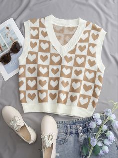 Trendy Beige Tank Vest, Trendy White Summer Sweater Vest, Trendy White Sweater Vest For Summer, Casual Brown Summer Sweater Vest, Casual Brown Sweater Vest For Summer, Trendy Cream Sleeveless Tank Top, Trendy White Sweater Vest, Trendy White Spring Vest, Trendy White Sleeveless Sweater Vest