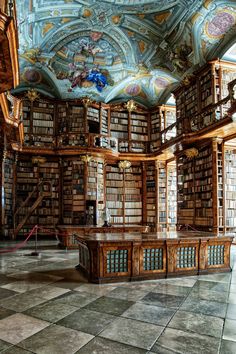 the interior of a library with many bookshelves