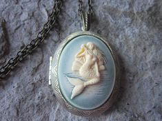 For sale are perfectly detailed, mermaid cameo bronze lockets.... Gorgeous!!! Choose your color. I have several different colors, styles and finishes, so please do browse my store. About 2 long, please see the photos. They are offered at a reasonable price, make perfect gifts, and are wonderful Medieval Things, Ocean Vacation, Tropical Ocean, Purple Mermaid, Mermaid Lover, Vacation Cruise, Blue Mermaid, Money Clips, Cameo Jewelry