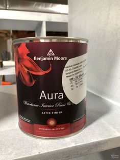 a can of paint sitting on top of a counter