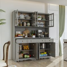 an open cabinet in the middle of a room with dishes and utensils on it