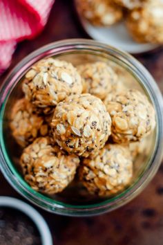 a glass bowl filled with oatmeal energy bites