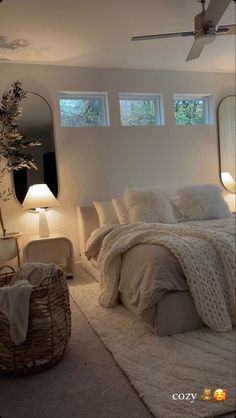 a bedroom with white walls and carpeted flooring