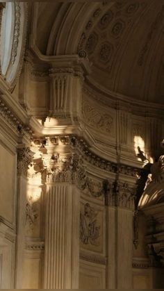 the light shines through the windows in an ornate building