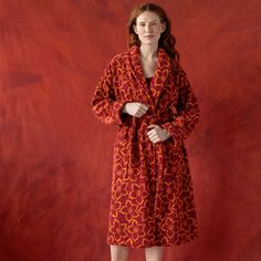 Cozy robe with full-length sleeves. Printed with a pattern of star-shaped flowers. Warm shawl collar, ties at the waist and two patch pockets in front. “Stars” terry robe: 100% organic cotton. Machine wash warm, colors cycle. Made in Moreira de Cónegos, Portugal. Gudrun Sjödén "Stars" Terry Robe In Organic Cotton - Cranberry Hippie Mode, Terry Robe, Warm Shawl, Scandinavian Fashion, Essential Dress, Folk Fashion, Embroidered Clothes, Clothing Essentials, Pullover Shirt