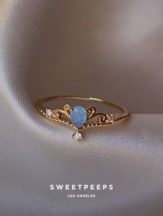 Aviva Princess Aqua Ring – SP Inc. Simplistic Jewelry, Cute Promise Rings, Ethereal Jewelry, Aqua Ring, Pretty Engagement Rings, Cute Engagement Rings, Princess Jewelry, Jewelry Accessories Ideas, Jewelry Essentials