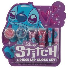 Package Dimensions: 7.44" x 7" Lip Gloss Tubes Net Weight: 0.40 Ounces (12g) Lip Gloss Pots Net Weight: 0.18 Ounces (5.2g) Lip Gloss Wands Net Weight: 0.08 Ounces (2.2g) Scent: Cherry, Sweet Mint & Lovely Vanilla Material: Plastic Color: Blue, Pink, White & Purple Age Grade: 8+ Care & Safety: For External Use Only; Do Not Ingest UPC: 889628204423 Quantity: 6 Everyone's favorite little aliens now come in a darling lip gloss set! Stitch & Angel Lip Gloss Set is colorfully designed to feature Stitch and Angel in darling poses. It comes with lip gloss in three different types of containers, and includes glosses that are both flavored and filled with shimmering glitter. Enjoy this fun set of merch from two adorable Disney characters! Lip Smackers 90s, Stitch Merchandise, Lilo And Stitch Merchandise, Lip Gloss Balm, Best Lip Gloss, Sweet Mint, Makeup Sets, Gender Fluid, Sister Christmas