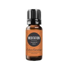 the bottle of meditation essential oil with an orange and black label that reads, eleons