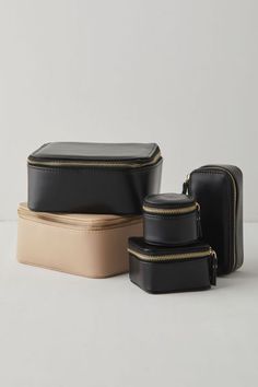 Stow your twinkling treasures when you travel with this jewelry case from Mele and Co Crafted from vegan leather lined with anti-tarnish microsuede, this jewelry case offers a variety of storage solutions for your twinkling treasures. Equipped with three smaller jewelry cases that rest inside one larger box. The lid of the larger case features shirred catch pockets with 5 snap-down straps. Features Bento-style jewelry case from Mele and Co Crafted from vegan leather lined with anti-tarnish micro Jewelry Cases, Travel Jewelry Box, Small Case, Leather Products, Brand Sale, Travel Jewelry, Small Jewelry, Jewelry Case, Black Fits