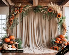 a decorated stage with pumpkins, hay and sunflowers in the center for a fall wedding