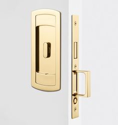 an open door with a handle on the front and side of it is shown in polished brass