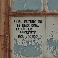 an old window with some writing on it