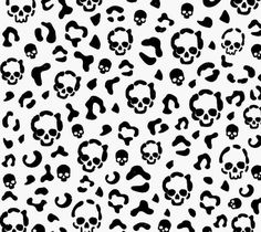 black and white skulls and bones pattern on a white background stock photo - budget conscious