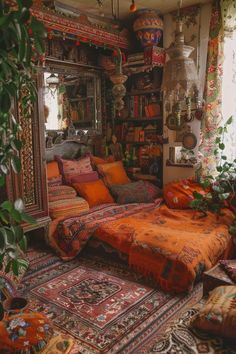 a room filled with lots of colorful pillows and rugs next to a large mirror